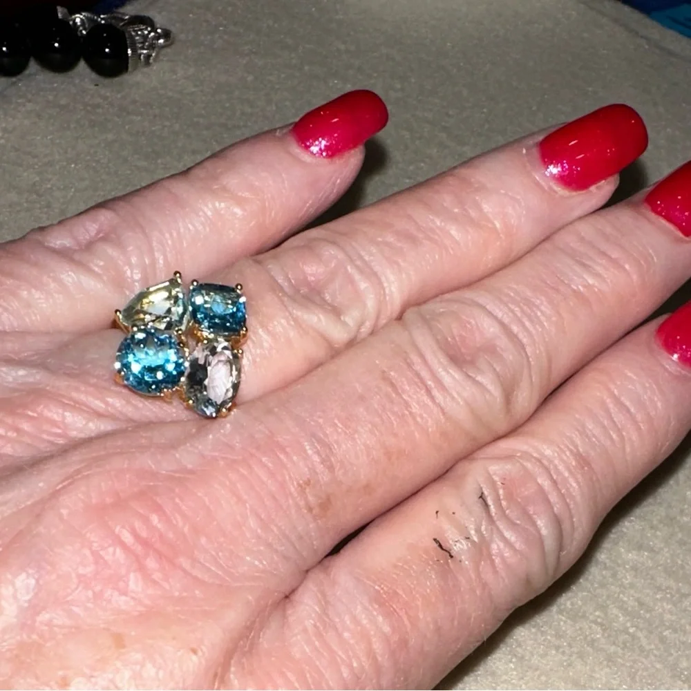 Uniquely set 4 stone Blue Topaz Gemstone Ring